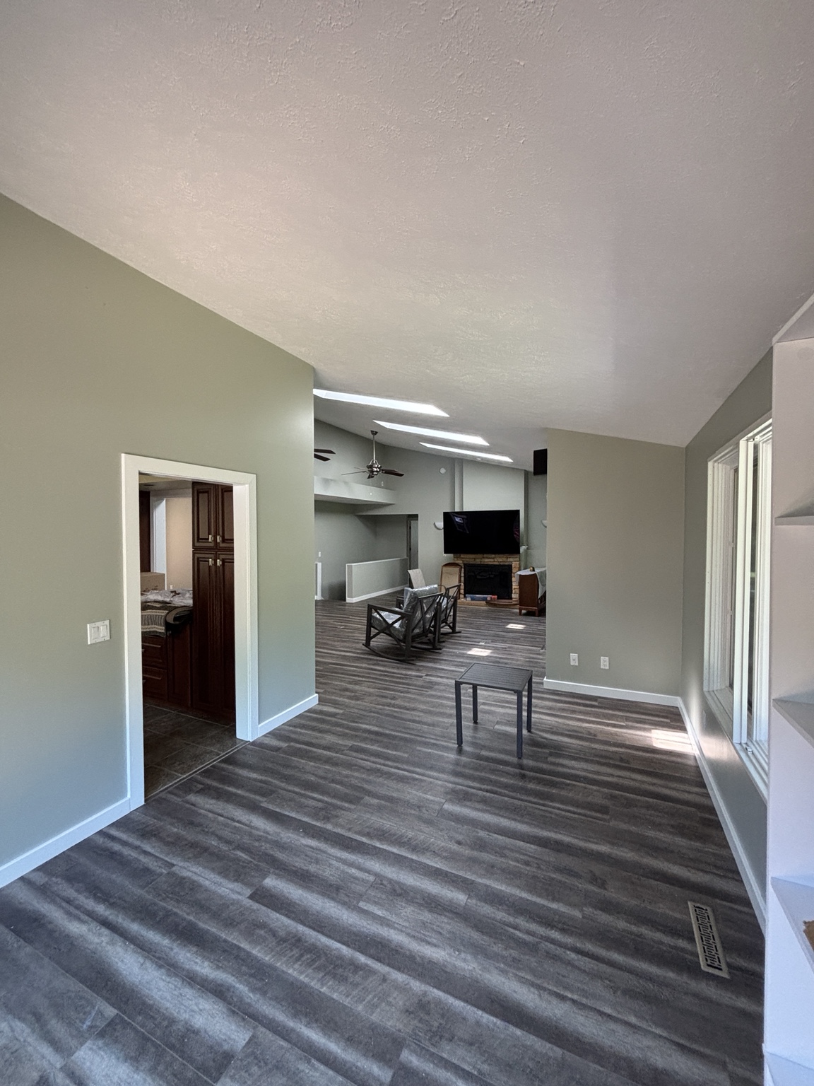 Finished open interior with coordinated soft gray walls and white trim